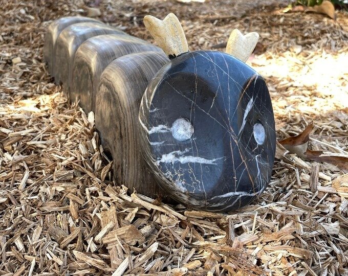 Marble caterpillar sculpture by Bruce Bennet, Knoxville, TN sculptor.