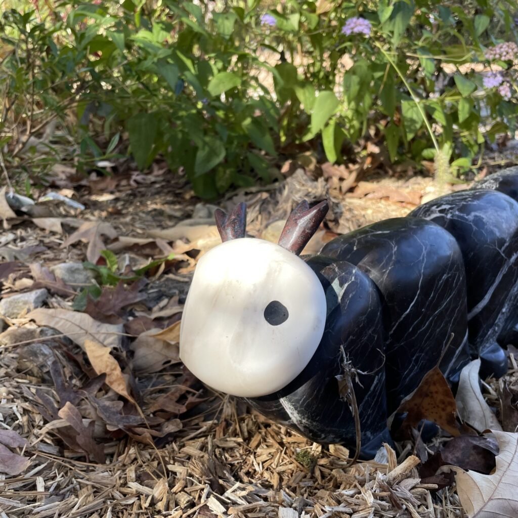 Marble caterpillar sculpture by Bruce Bennett, Knoxville TN.