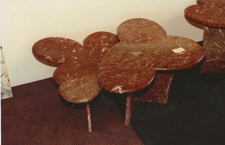 Set of nesting coffee tables by Bruce Bennett in Tennessee cedar, with overlapping rounded tabletops.