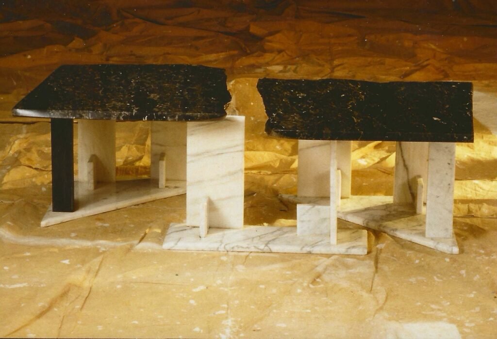 Bruce Bennett marble table maquettes with black marble tops and contrasting white marble bases.