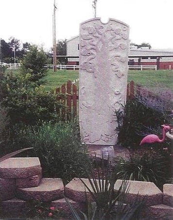 Matt Davis’s Tree of Life, a carved Tennessee marble stele with organic tree forms, created for the 2003 One-Ton Symposium.